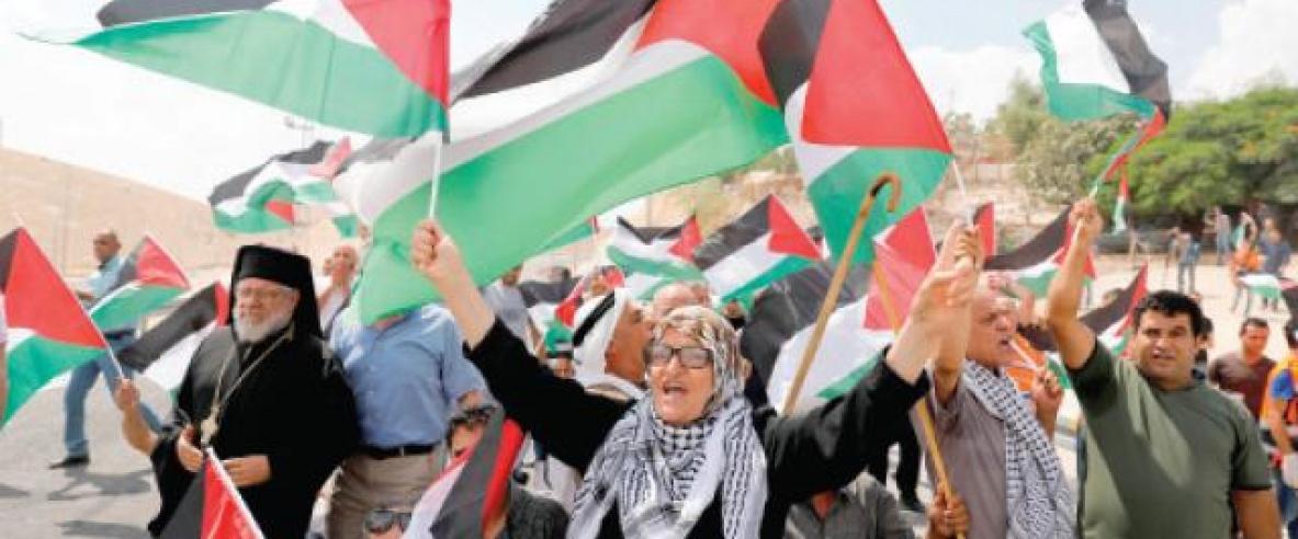 مسيرة في قلقيلية لرفع العلم الفلسطيني تأكيدا على رمزيته