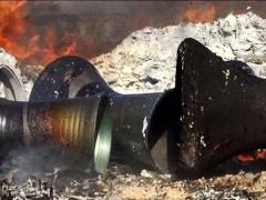 بالصور.. داعش يحطم آلات موسيقية ببني غازي