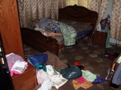 بالصور: اعتقال شاب من سنجل بعد تفجير باب منزله