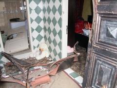 بالصور: اعتقال شاب من سنجل بعد تفجير باب منزله