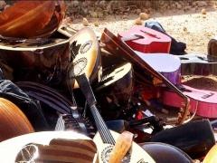 بالصور.. داعش يحطم آلات موسيقية ببني غازي