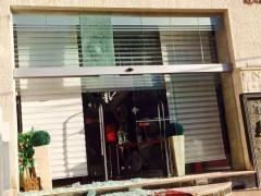 مجهولون يطلقون النار على محل تجاري بنابلس