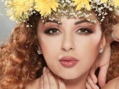 صور- ميريام فارس تثير ضجة بتغطية جسدها العاري بقبعة