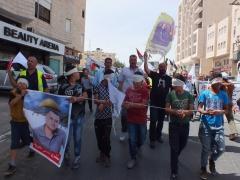 تظاهرة جماهيرية تضامناً مع الأسرى المضربين في سجون الاحتلال بمناسبة يوم العمال العالمي