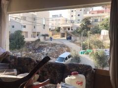 صور- الإحتلال يعتقل الدكتورة أمل الكامل بعد تفجير منزلها فجراً