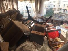 صور- الإحتلال يعتقل الدكتورة أمل الكامل بعد تفجير منزلها فجراً