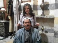 بالصور .. دلال في باب الحارة بصور تظهر وزنها الزائد