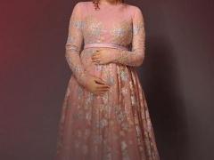 بلقيس فتحي تبرز حملها في جلسة تصوير جديدة