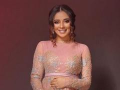 بلقيس فتحي تبرز حملها في جلسة تصوير جديدة