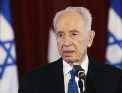 بيريز ينفي اتهامات الرئيس اللبناني لاسرائيل بالمسؤولية عن تفجير بيروت