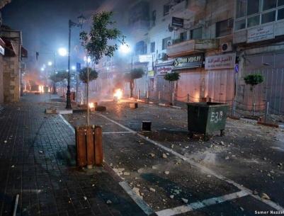 الشرطة تقبض على 17 شخصا ممن شاركوا في الاعتداء على مركز شرطة رام الله