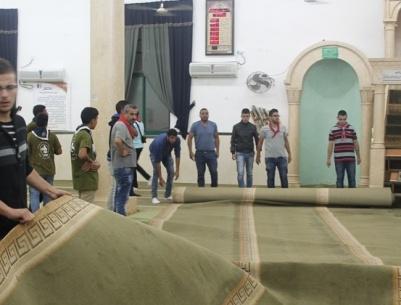 المجموعات الكشفية في بيت لحم تشارك بعمل تطوعي في مسجد عمر