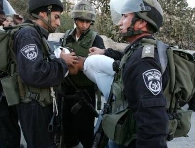 اعتقال عنصريّ أمن فلسطينيين في القدس