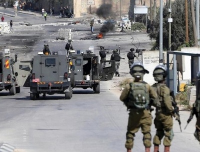 إصابة طفل وشاب برصاص الاحتلال الحي واعتقال آخرين والاستيلاء على أموال من الظاهرية