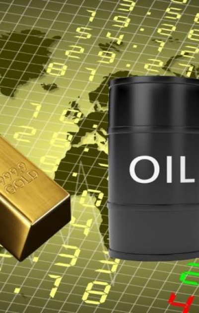 الذهب يتراجع والنفط يرتفع بأكثر من 2%