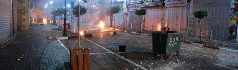 الشرطة تقبض على 17 شخصا ممن شاركوا في الاعتداء على مركز شرطة رام الله