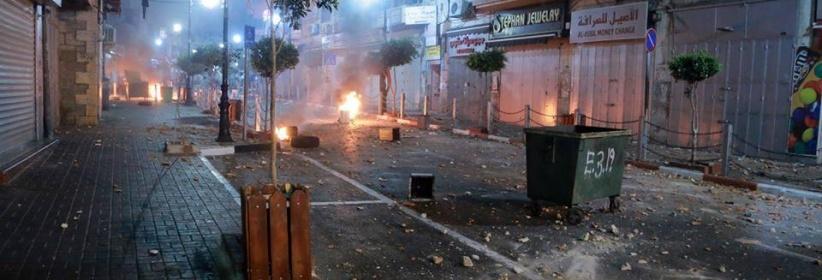 الشرطة تقبض على 17 شخصا ممن شاركوا في الاعتداء على مركز شرطة رام الله