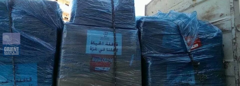 بالصور : وصول قافلة الحياة 2 الى مقر جمعية الشبان المسيحية في غزة