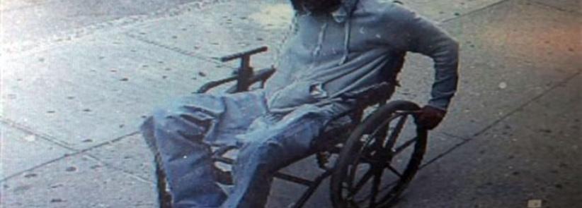 لص على كرسي متحرك يسرق بنكا ويهرب