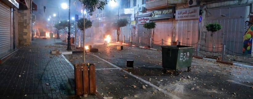 الشرطة تقبض على 17 شخصا ممن شاركوا في الاعتداء على مركز شرطة رام الله