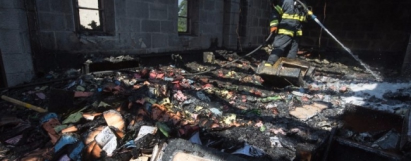 اعتقال مشتبهين بحرق كنيسة (الخبز والسمك)