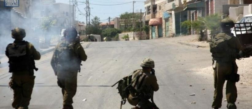 إصابة طفلين برصاص الاحتلال واعتقال 10 اخرين في البيرة