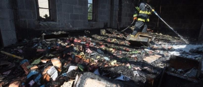 اعتقال مشتبهين بحرق كنيسة (الخبز والسمك)