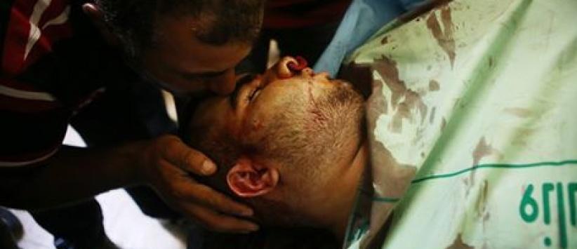 صور:- شهيد برصاص الاحتلال قرب حاجز قلنديا