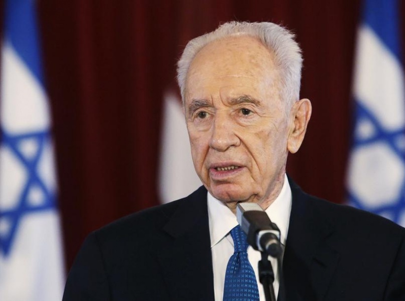 بيريز ينفي اتهامات الرئيس اللبناني لاسرائيل بالمسؤولية عن تفجير بيروت