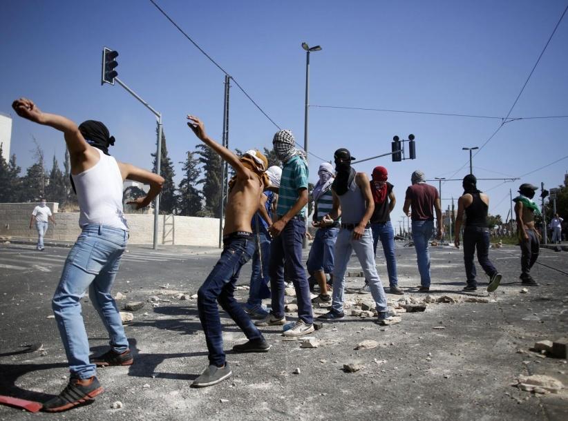 مواجهات واصابات في القدس والاحتلال يعزز قواته
