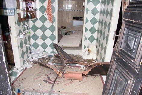 بالصور: اعتقال شاب من سنجل بعد تفجير باب منزله