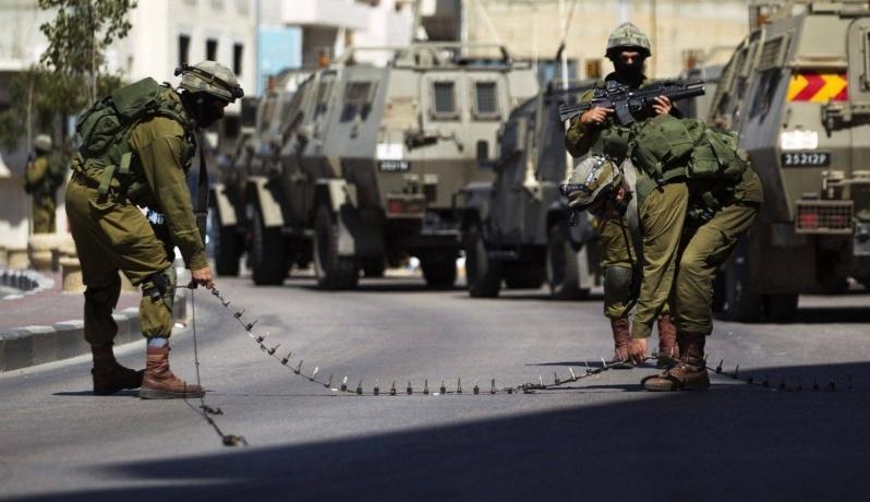 اغلاق شارع 585 في يعبد وإصابات ومداهمات في جنين