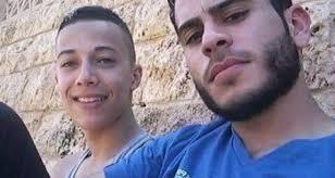 تسليم جثماني الشهيدين علان وأبو غوش