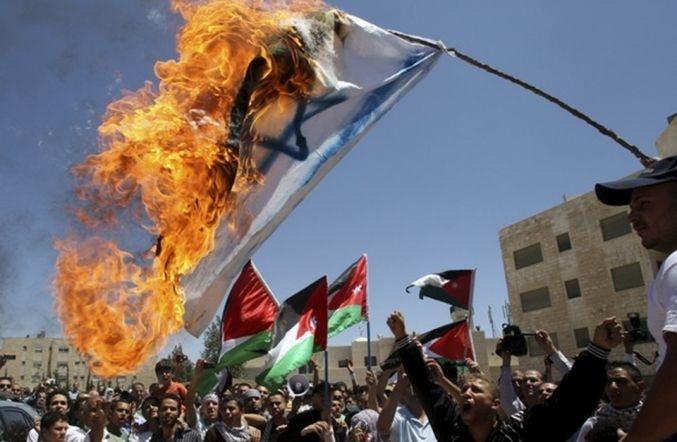 السجن والغرامة لمن يحرق علم إسرائيل