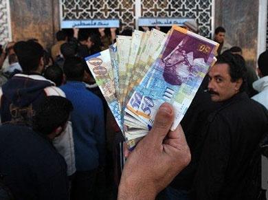 المالية: صرف رواتب الموظفين الأحد المقبل