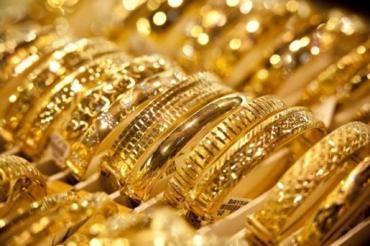 الذهب ينخفض الى ادنى مستوياته منذ 9 أشهر
