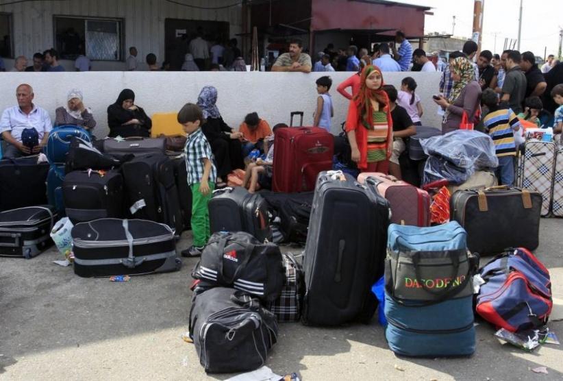 مغادرة 2058 مسافراً عبر معبر رفح خلال 3 أيام