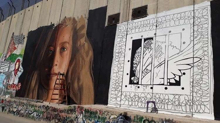 بيت لحم تتزين بصور الأيقونة الفلسطينية عهد التميمي استعدادا للإفراج عنها