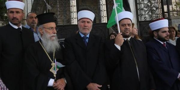 مجلس كنائس رام الله ينظم وقفة تنديدًا باعتداءات الاحتلال على المقدسات ورجال الدين