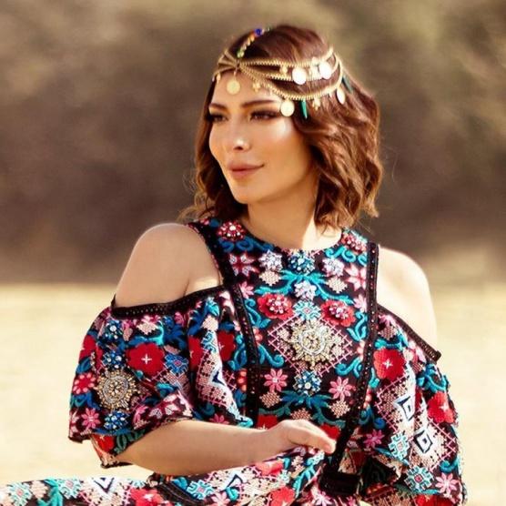 بالصور: أصالة وأحلام معركة كادت تشتعل بسبب تعليق لم يكتب