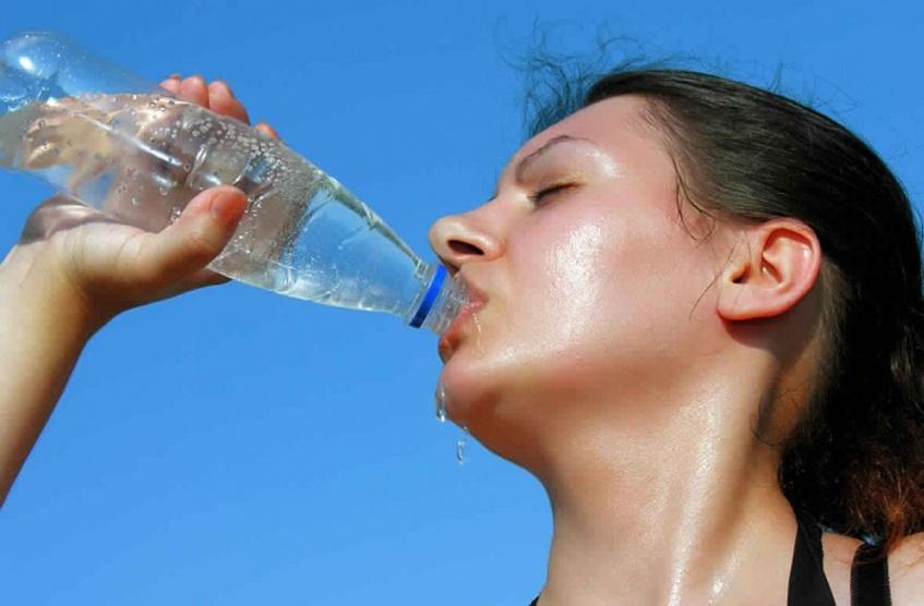 ما أعراض الضربة الحرارية؟