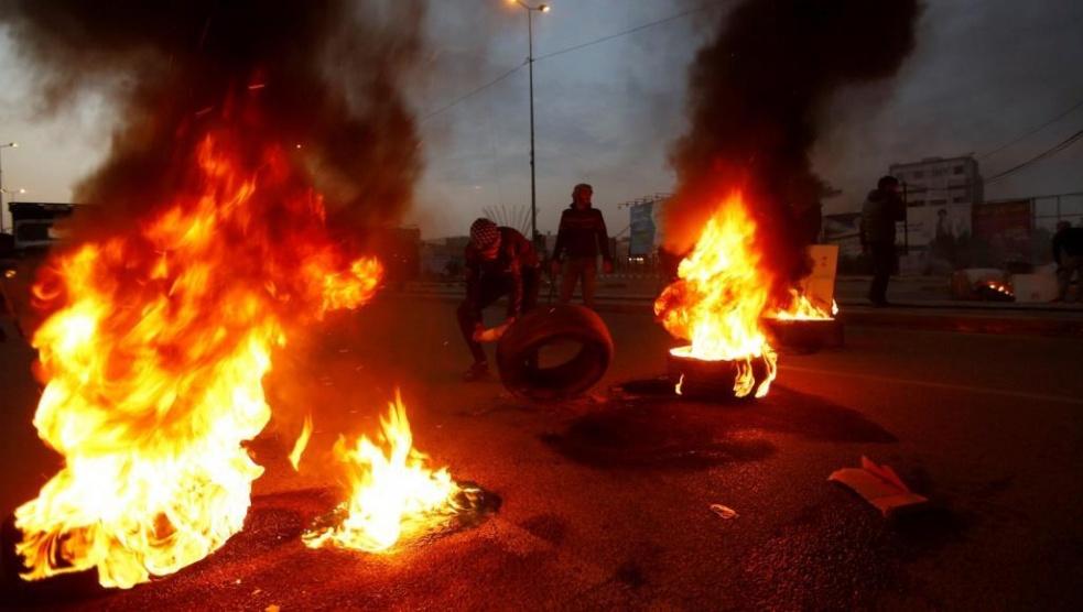 قتيل وجرحى بمواجهات المتظاهرين وقوات الأمن في بغداد