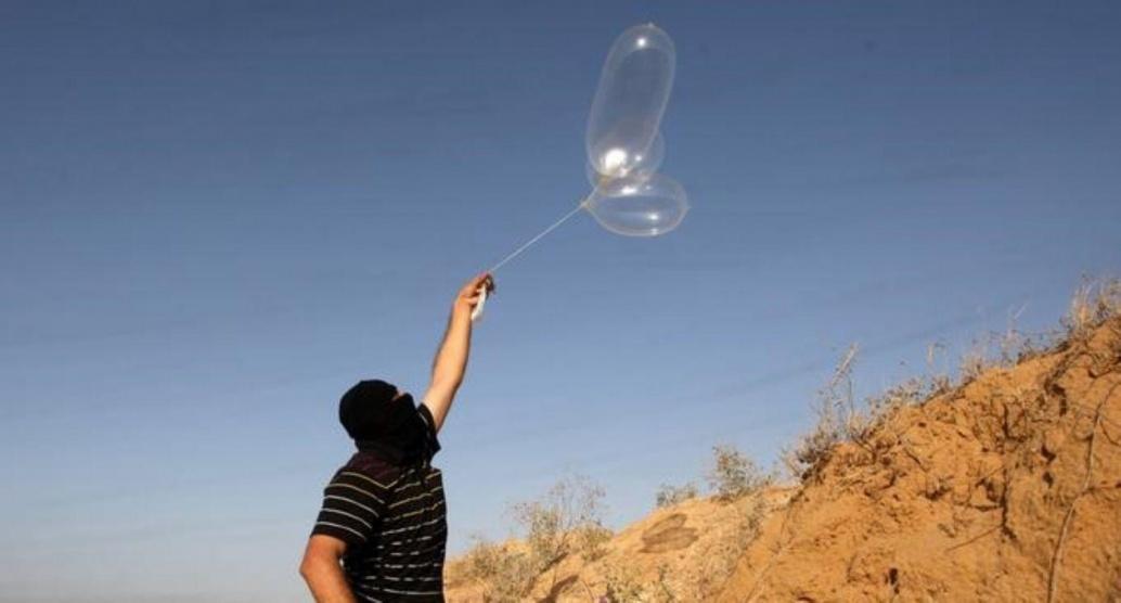 اسرائيل تتوعد حماس برد مدمر بسبب البالونات الحارقة