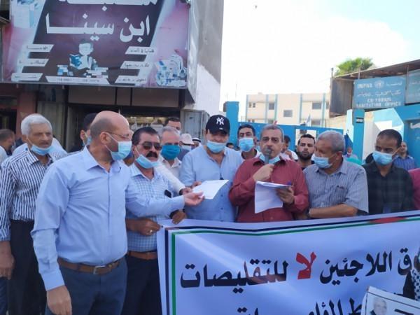 وقفة احتجاجية ضد تقليصات وكالة الغوث بخان يونس