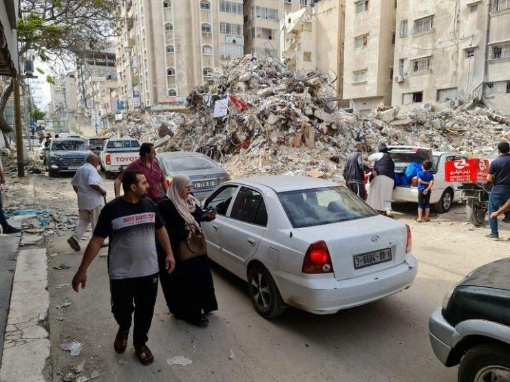 الحياة تعود تدريجيا لغزة بعد 5 ايام من القصف والتدمير