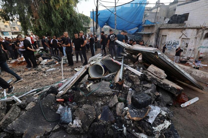 ‫ وزيرة الصحة تتفقد آثار الدمار الناتج عن عدوان الاحتلال على مخيم نور شمس