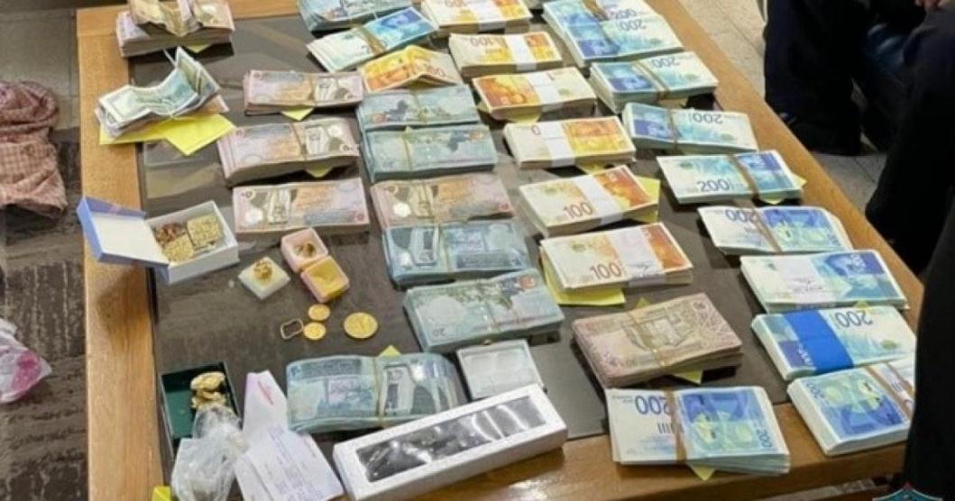 شرطة جنين تكشف ملابسات جريمة سطو وتضبط مبلغاً مالياً كبيراً